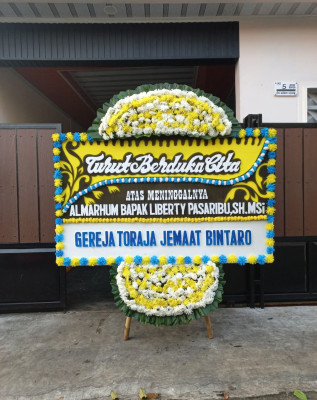 Papan Bunga Duka di Sajira
